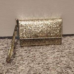 kate spade Gold Glitter 3/4 Flap Wristlet with Storybook Lining EUC